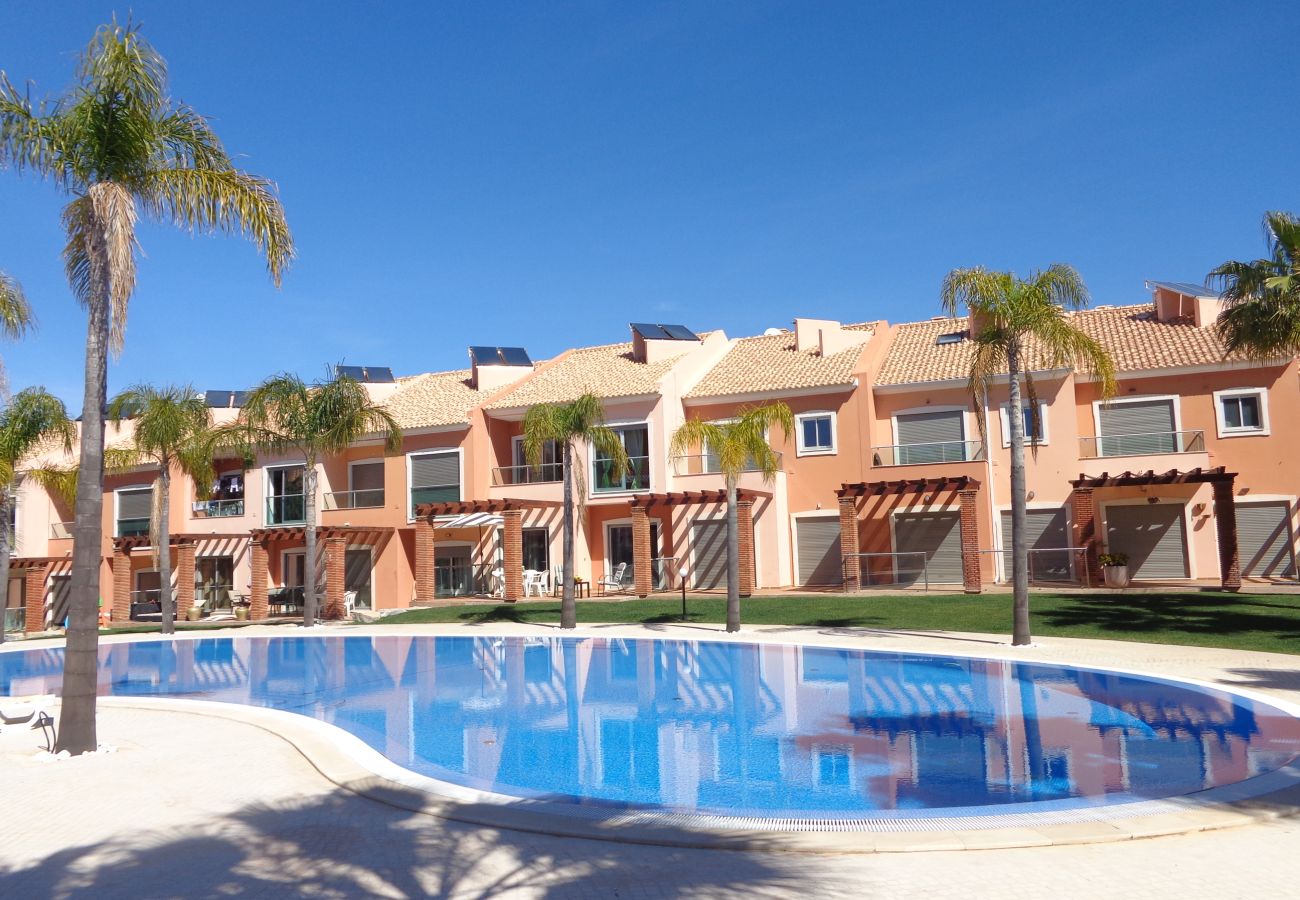 Shared swimming pool in a gated condominium with houses in Albufeira